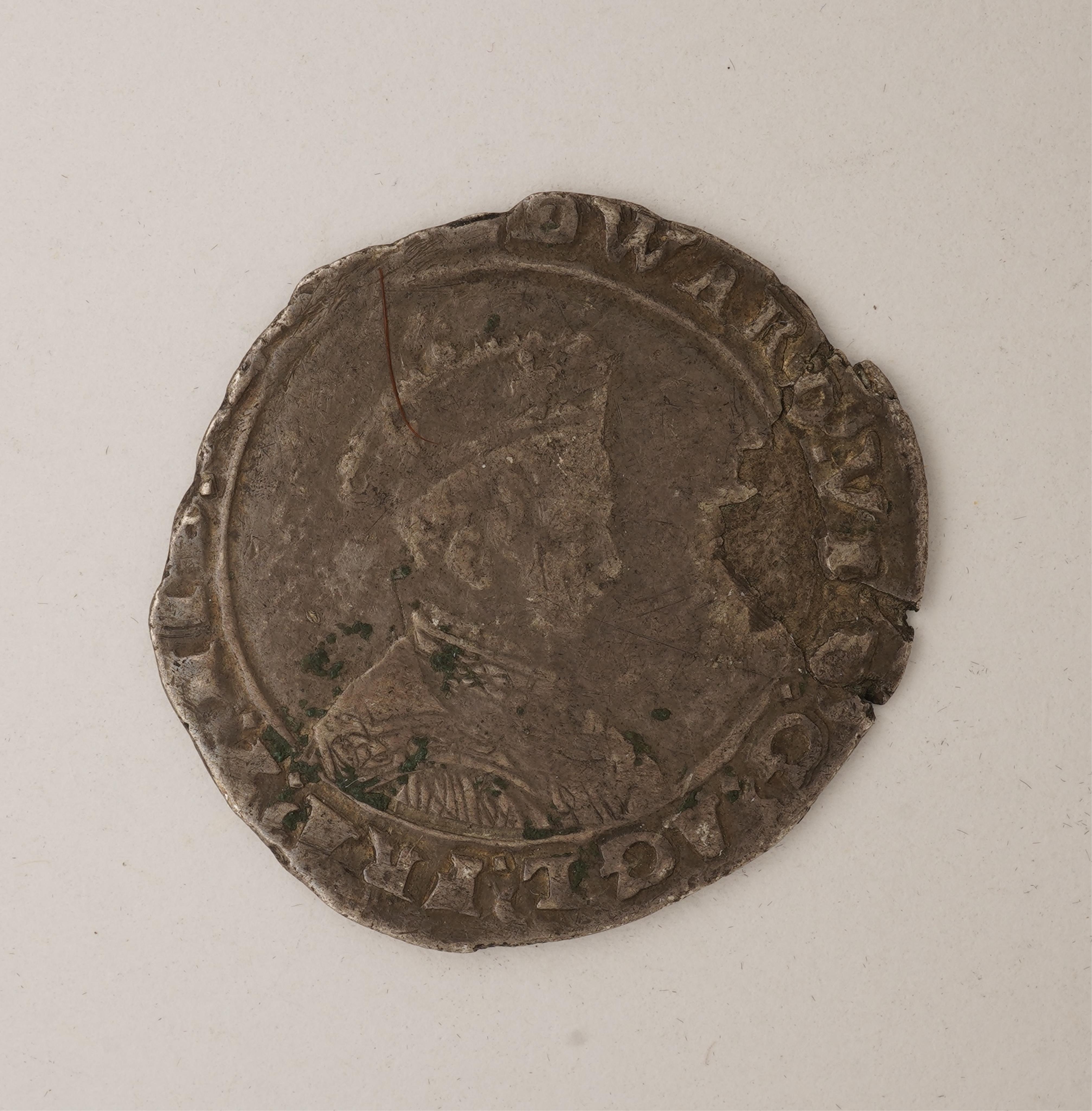 British hammered coins, Edward VI, debased silver shilling, 1549-50, rev. TIMOR [MD]L, mm. Swan, S. 2466, 3.8g, irregular flan, surface flaking and splits, otherwise VG.